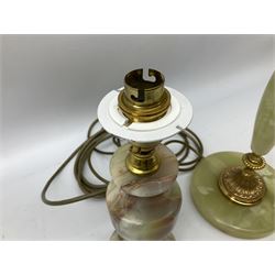  20th century gilt metal and onyx four branched candelabra upon a circular base, and onyx table lamp in the form of an urn, tallest example H48cm