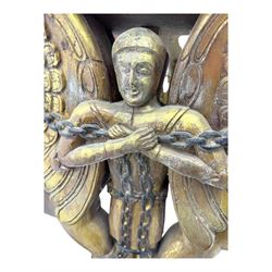 19th century Renaissance Revival carved and giltwood centre table, the rectangular top with gadrooned edge and carved frieze of repeating arched motifs with stylised scrolls, supported by a pair of carved winged griffin supports restrained by a central chained figure, on stepped rectangular bases united by carved stretcher