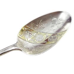 Pair of George IV silver strawberry spoons by Adam Elder, Edinburgh 1829, with later bright cut decoration and a matched Victorian sifter Edinburgh 1864, approx 5.3oz, retailed by Arnold & Lewis, Manchester cased