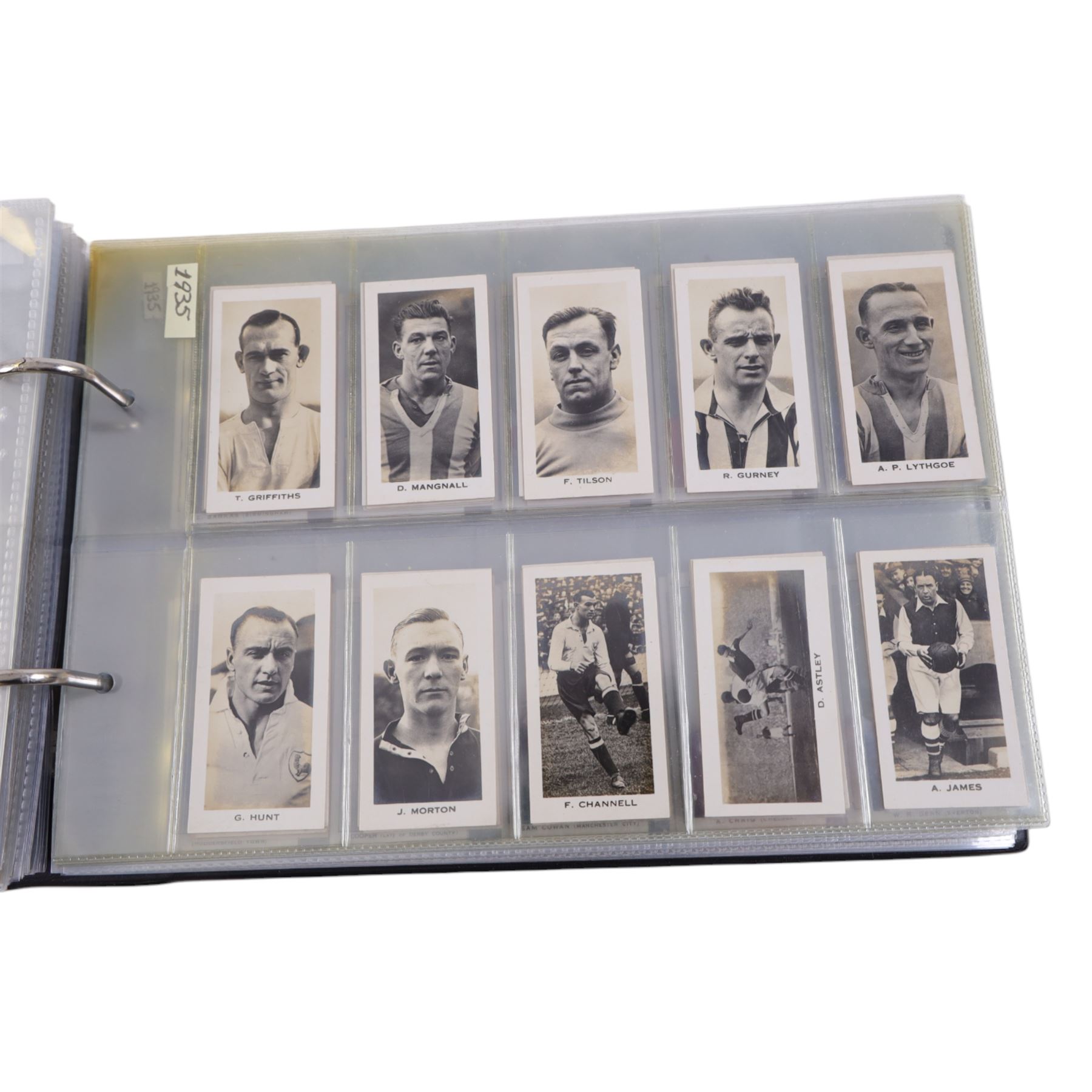 Collection of 1930s and later Football related trading and cigarette cards, including complete set of sixteen 1936 Topical Times Panel Portraits of Star Footballers, collection of further 1930s Footballer Panel Portraits, complete set of twenty-five 1955 The Wizard Famous Footballer cards, complete set of fifty Wills Association Footballers 1935, complete set of fifty Godfrey Phillips International Caps cards, etc, housed in three albums