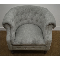  Chesterfield tub shaped armchair upholstered in silver fabric on turned supports, W83cm  