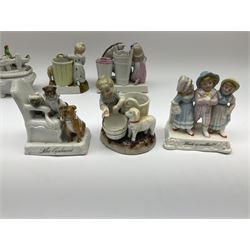 A group of six Victorian Fairings, to include The Orphans, modelled as three pugs seated on a beside a chair, Which is prettiest?, modelled as three young girls, two match holders and strikers, each modelled as a young female figure with bucket and lamb beside her, etc. 