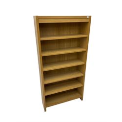 Oak open bookcase fitted with five adjustable shelves