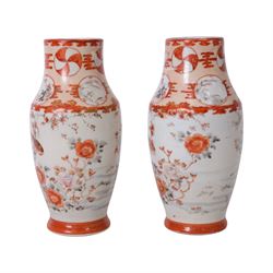 Pair of Japanese Meiji period Kutani vases, of baluster form decorated with a bird amongst...