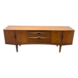 Stonehill - mid-20th century teak sideboard, three central drawers flanked by concertina cupboard doors, on tapering supports