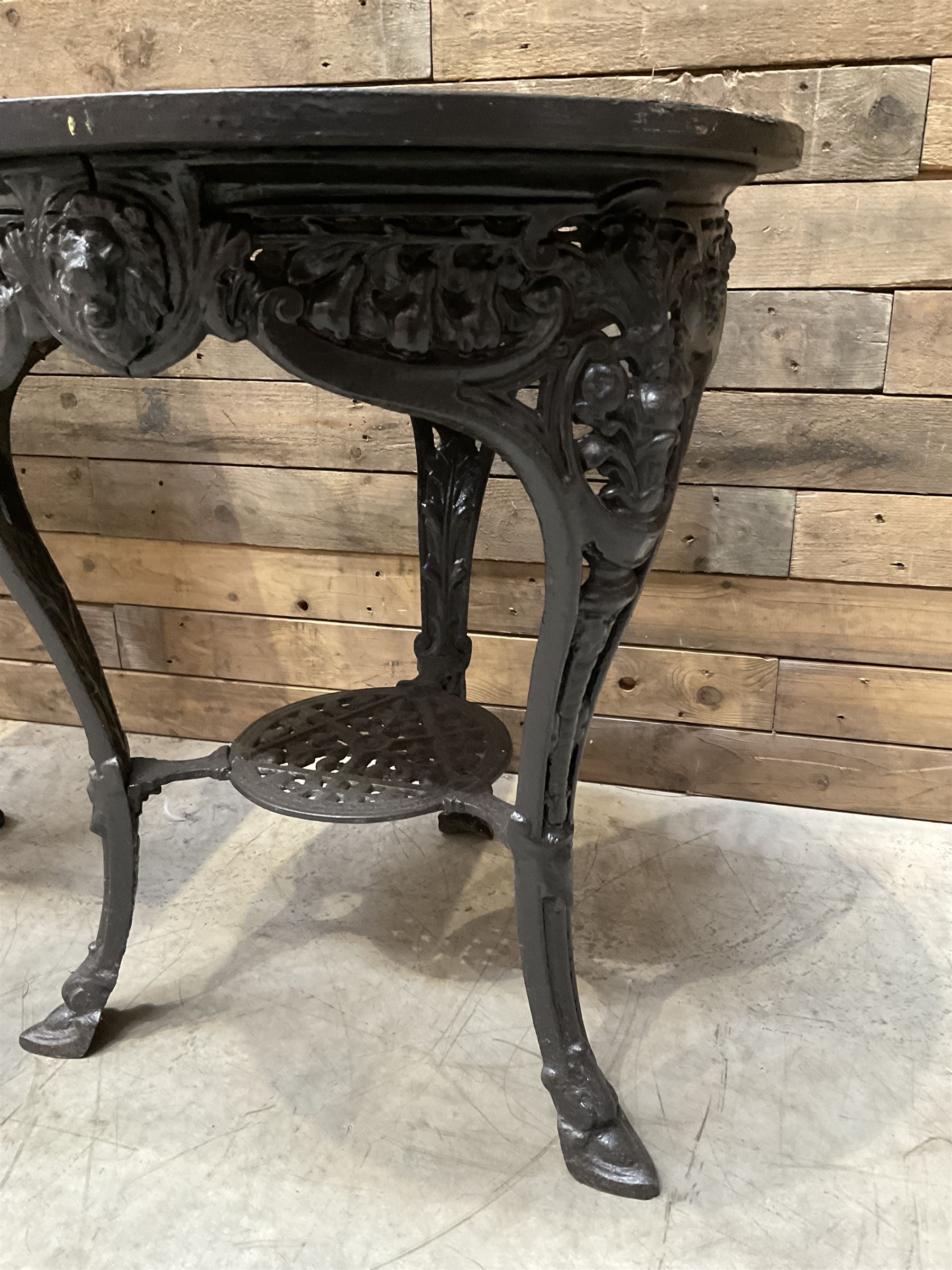 19th century cast iron Coalbrookdale design table with circular top (D66cm, H74cm) and a cast iron pedestal table with square top (W69cm, D70cm, H72cm)