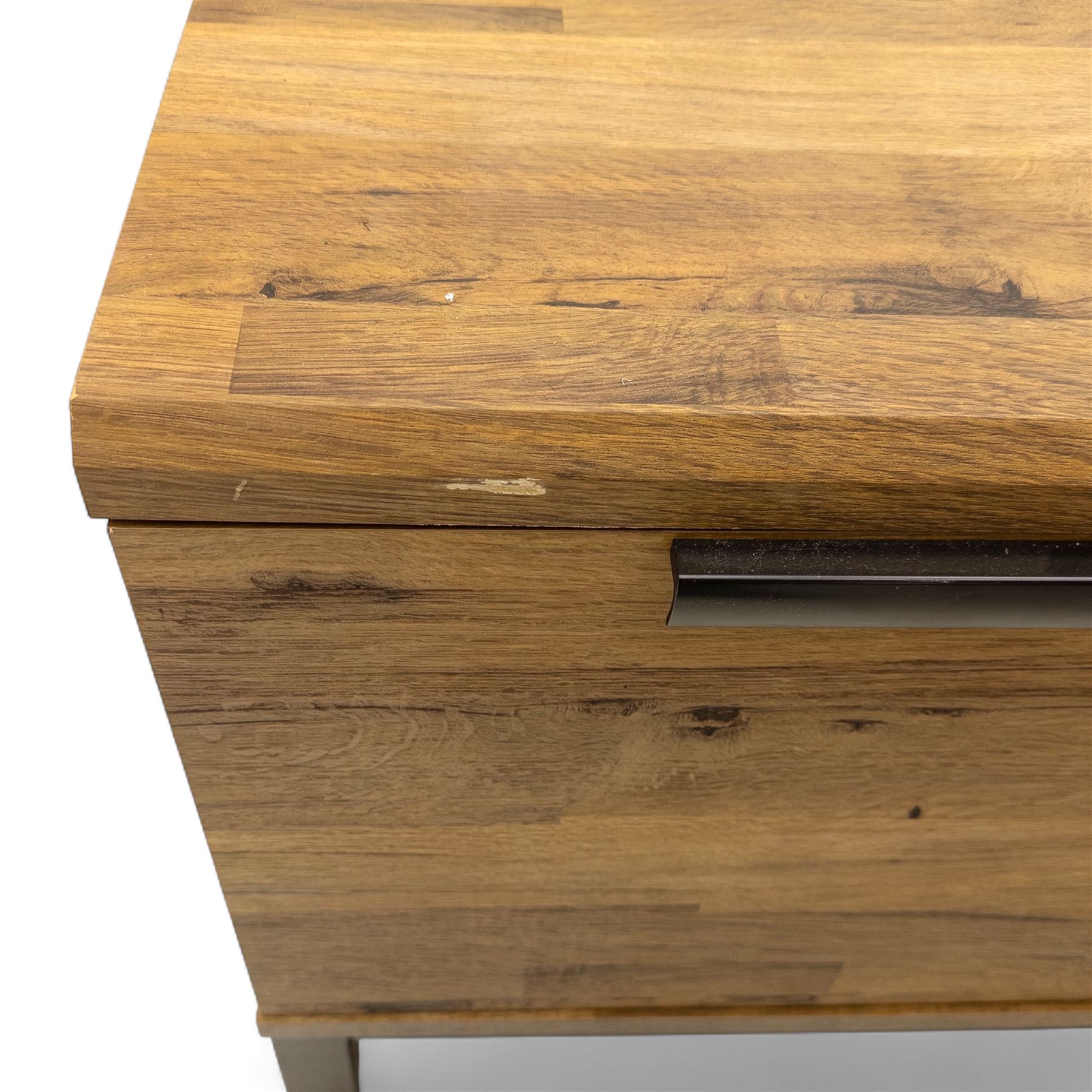 Pair of contemporary media sideboards, oak effect construction with inset handles, comprising two drawers and an open shelf flanked by cupboard doors, on metal supports (2)