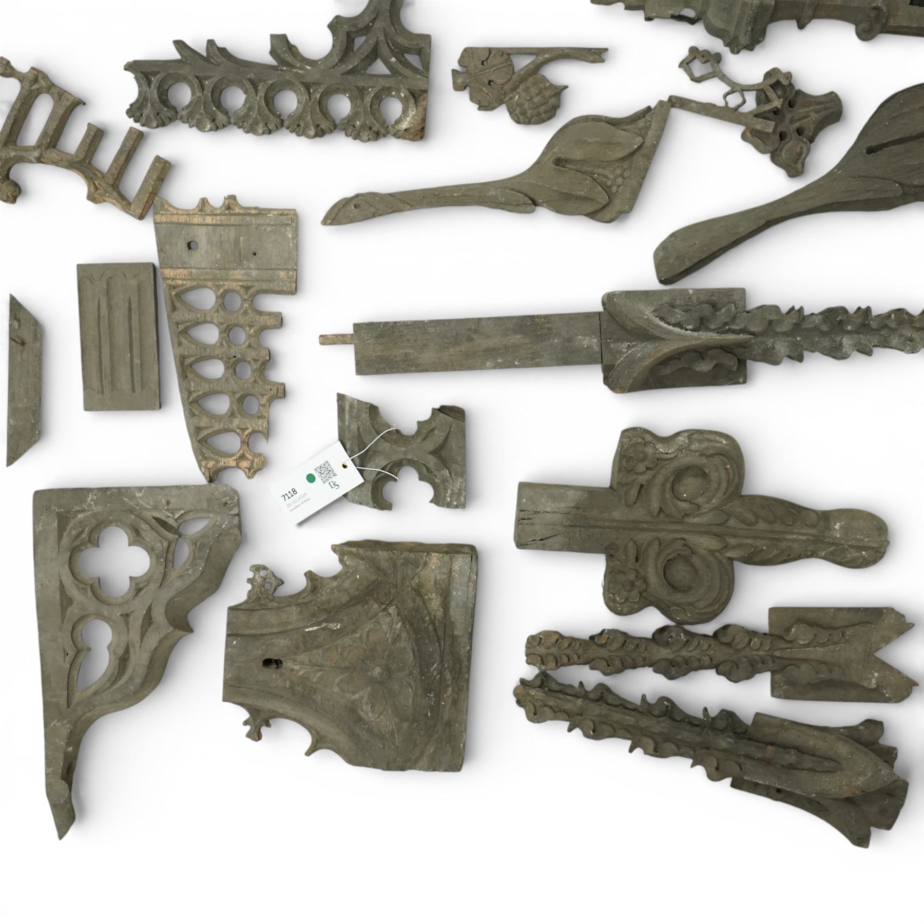 Architectural Salvage - Collection of oak ecclesiastical carvings, 19th century, comprising various finials, including four crocketed examples, some with fruit and foliate carved motifs, corbel, and others
Notes: Removed in the 19th century from the church in the grounds of a private Yorkshire estate 
Provenance: property of a Nobleman