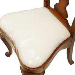 Set of eight (6+2) Dutch design walnut and floral marquetry dining chairs, the high backs with shaped cresting rail over a vasiform splat inlaid with Neoclassical urns and bouquets of foliage and bellflowers, ivory upholstered drop-in seat over scallop shell inlaid apron and cabriole supports with pad feet