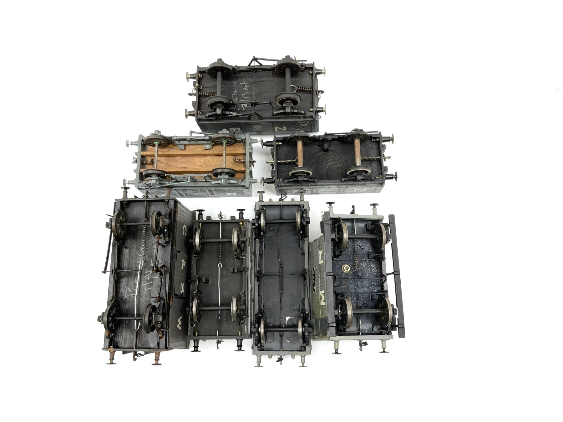 '0' gauge - three scratch-built Midland Railway wagons including brake van, hoppered wagon and long flat bed wagon; three similar North British wagons; and G. & S.W. covered wagon; all unboxed (7)
