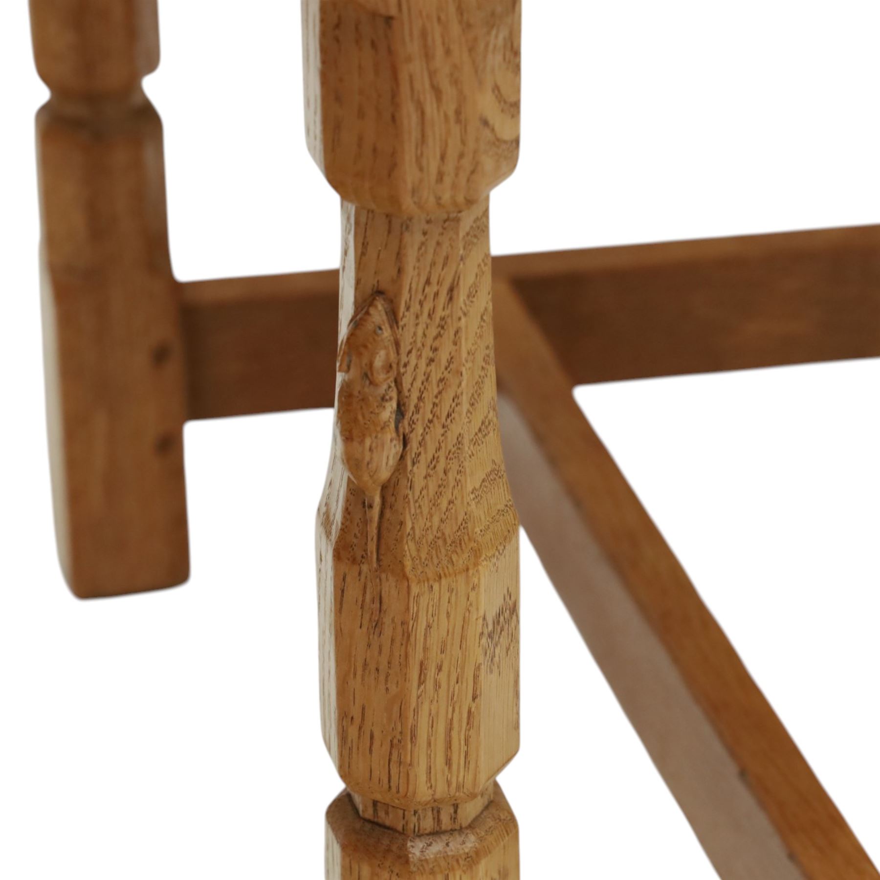Mouseman - set of eight light oak dining chairs, each with lattice panel back and tan leather upholstered seat, raised on octagonal front legs joined by stretchers, with signature carved mouse, by the workshop of Robert Thompson, Kilburn