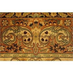  Large rug carpet, decorated with scrolling foliage and flower head motifs, central rosette medallion, 390cm x 300cm    
