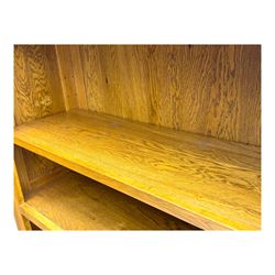 Oak Furnitureland, golden oak open bookcase fitted with single drawer