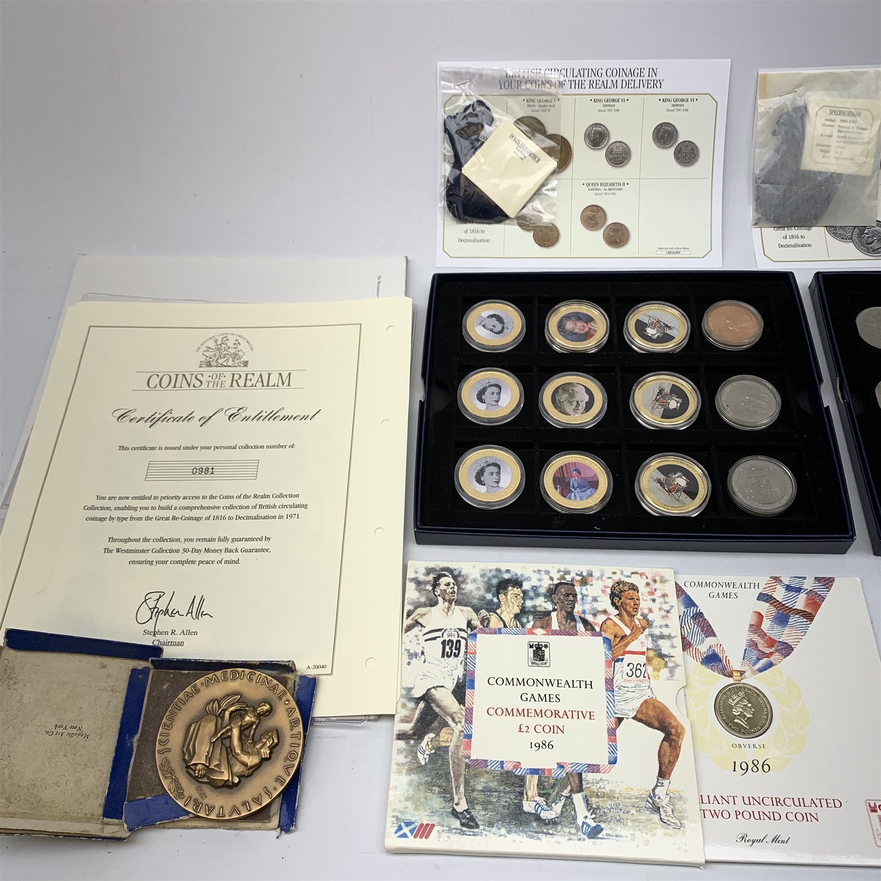 Mostly modern commemorative coins including United Kingdom brilliant uncirculated 1986 commonwealth games two pound coin, coin covers, 'Remembrance Day 11th November' commemorative coin, commemorative crowns etc