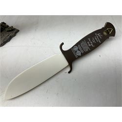 The Bradford Exchange John Wayne bowie decorative knife, L27cm and John Wayne Tall in the Saddle Galloping Thunder figure group
