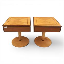 Art Deco style pair of walnut bedside tables, quarter matched veneered tops with crossbanded borders, fitted with single frieze drawers with chrome handles, on circular pedestal supports