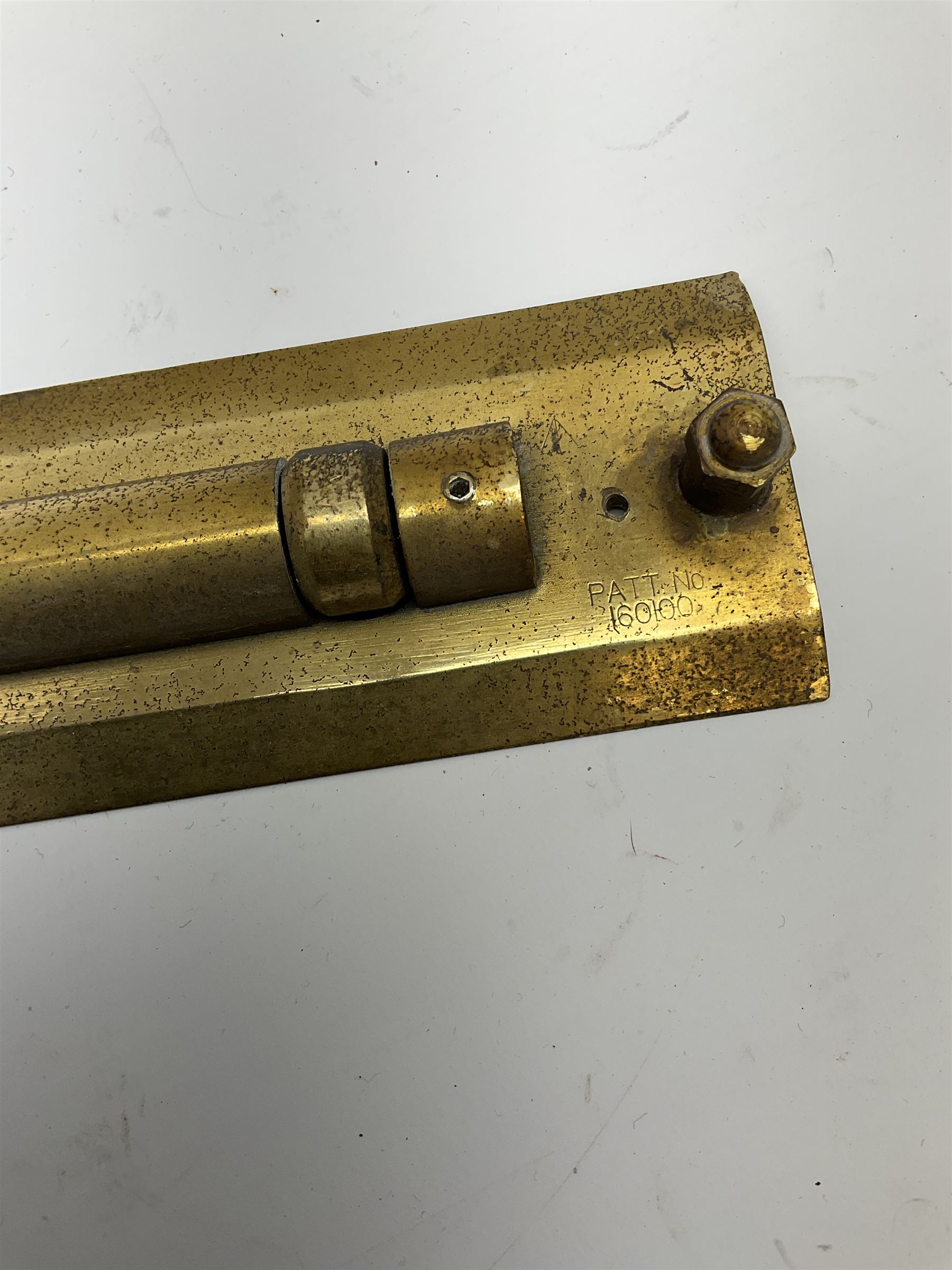 Brass and black painted maritime station pointer inscribed 6675-99-777-3202 Serial No.WMEL 0041 L45.5cm; Harling brass rolling ruler Patt.No.160100; and a parallel ruler; all unboxed (3)