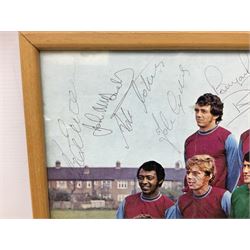 1970-1 photograph of West Ham United FC squad members, including Bobby Moore, Geoff Hurst, Harry Redknapp, Trevor Brooking, Jimmy Greaves, Billy Bonds etc, most players with signatures, 30 x 45cm, framed and glazed