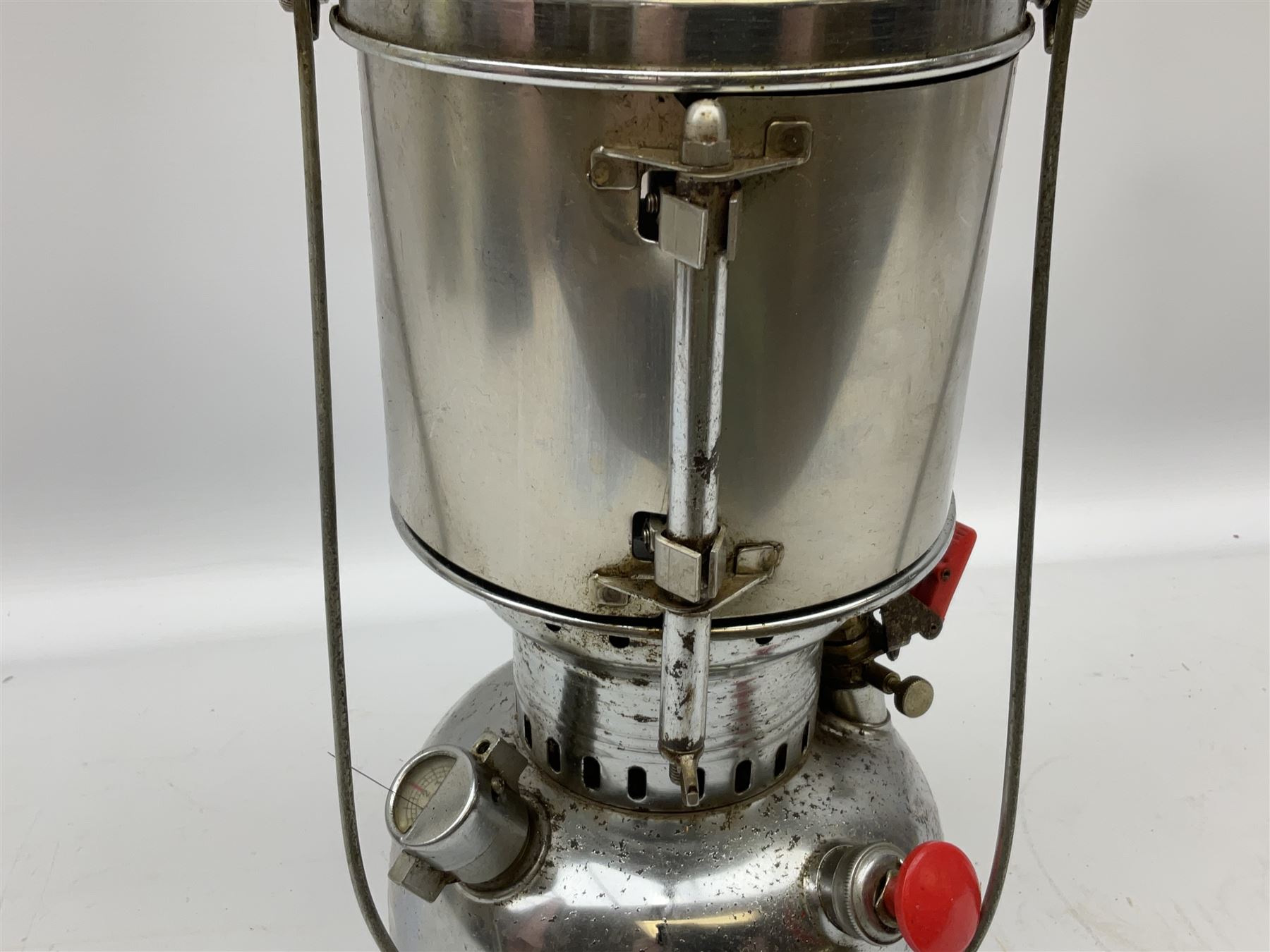 Copper and brass ship’s lamp marked ‘Anchor’, H25cm, Feuer hand storm lantern, Bialaddin Model 315 paraffin lamp and an Anchor lamp (4)