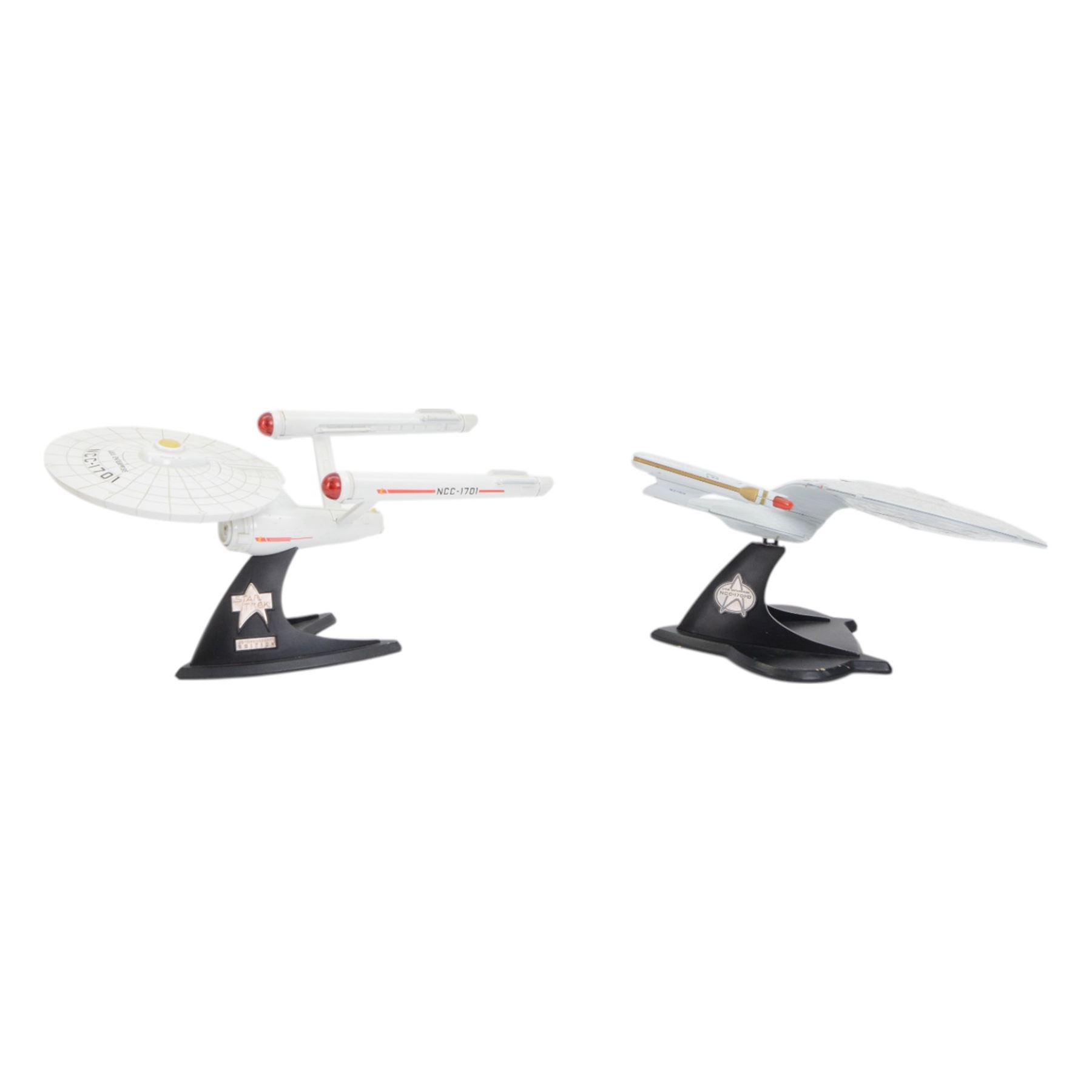 Two Paramount Pictures Star Trek die cast models, comprising USS Enterpirse NCC-1701-D and 25th Anniversary Edition USS Enterprise NCC-1701, both with stands