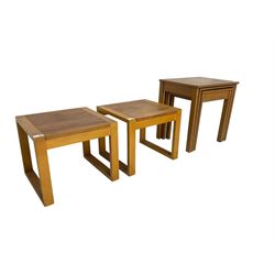 Mid-to late 20th century nest three teak side tables and pair two others (5)