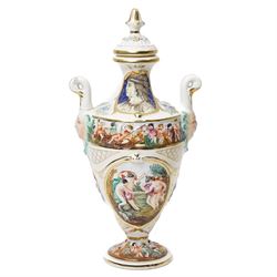 Capodimonte vase and cover decorated with a raised pattern of cherubic figures H32cm, another vases and cover with panels of figures H33cm, bowl and cover with similar decoration D20cm and two other Capodimonte pieces (5)