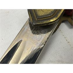 WW2 German Army Prinz Eugen Pattern Officers Dress Sword by Carl Eickhorn, the 80.5cm slightly curving fullered blade with makers name to the ricasso, gilt brass hilt with eagle to the cross-piece and relief of oakleaves to the ferrule, Prinz Eugen style down winged eagle to the pommel of the backstrap; grip retains the original wire binding; in original black painted scabbard with single hanging ring, leather hanger marked 'RZM M5/71 OLC' and silvered knot L97cm overall