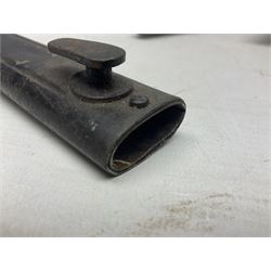 British No 7 MKI knife bayonet with 20cm single edged fullered clipped point blade;  blackened steel, large muzzle ring cross-guard; blackened swivelling pommel marked 'F5H'; red Tufnol composite grips; in blackened steel scabbard L33cm overall; British Pattern 1888 bayonet with scabbard; and German Ersatz bayonet with scabbard (3)