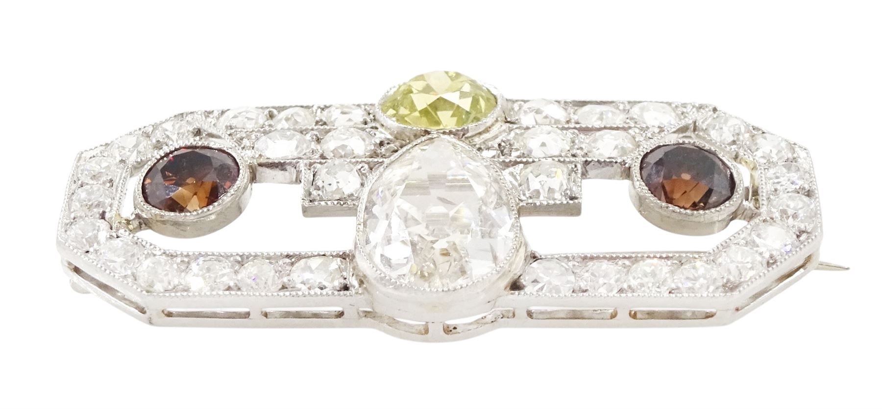 Early 20th century platinum diamond brooch, milgrain set with a pear cut faint brown diamond of approx 1.50 carat, an old cut fancy yellow / green diamond of approx 0.70 carat, and two old cut fancy orange / brown diamonds of approx 0.40 carat and 0.35 carat, surrounded by old cut white diamonds in an openwork setting, total white diamond weight approx 1.45 carat