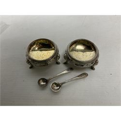 Pair of Victorian silver table salt cellars of cauldron form with gilt interiors, together with accompanying salt spoons, hallmarked Martin, Hall & Co, Sheffield 1879, total weight approx 100.5g