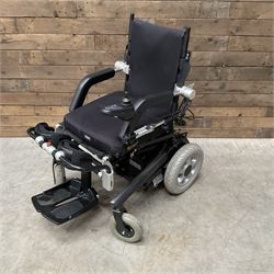 Permobil LSA Lifestand seated and standing wheelchair