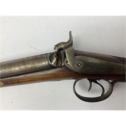 19th century 13-bore double barrel side-by-side percussion cap shotgun, the 72cm stub twist damascus barrels with ramrod under, walnut stock with chequered grip L117.5cm overall