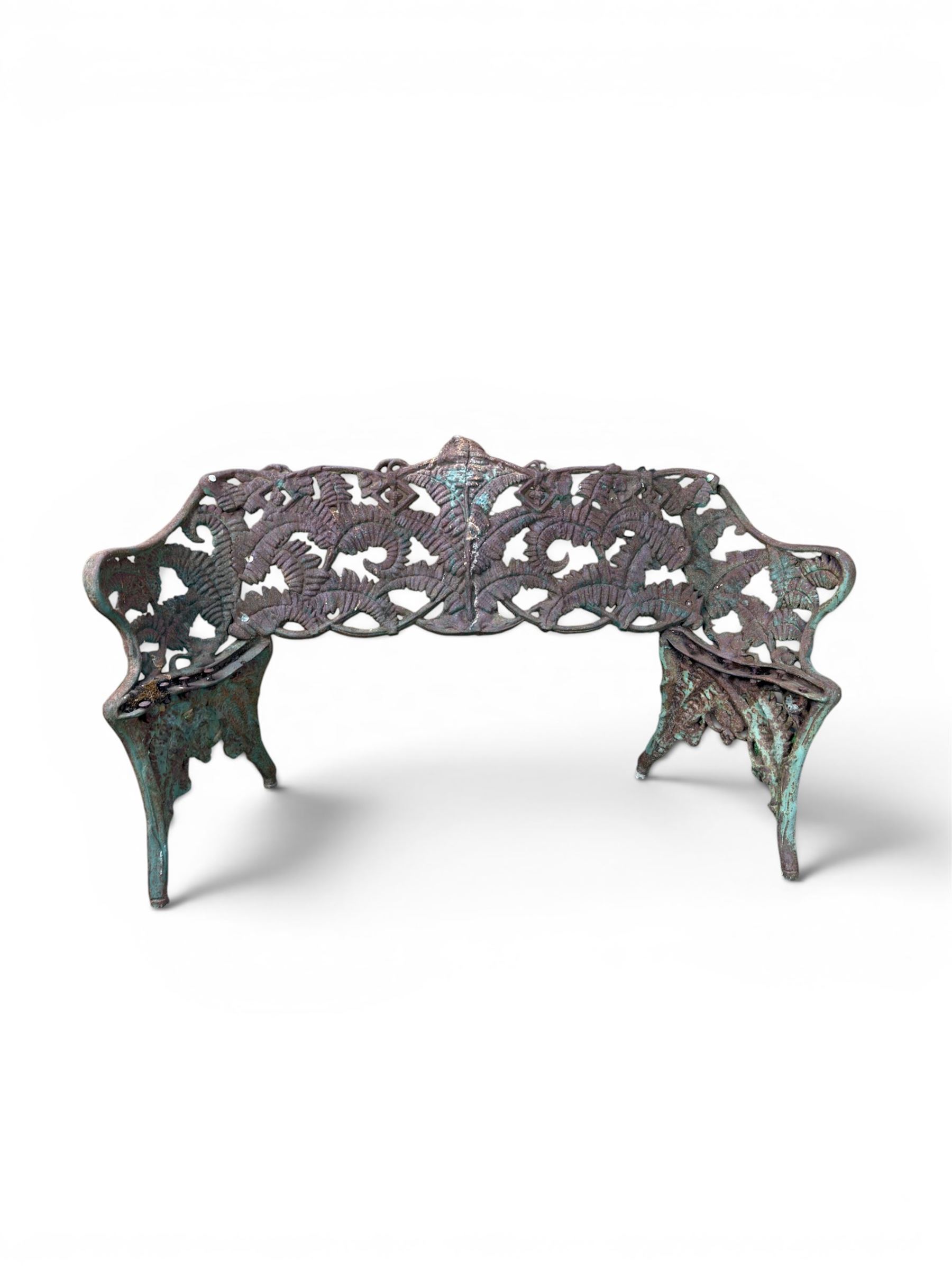 Victorian naturalistic design heavy cast iron garden bench, well defined fern pattern curved back-rest with arms, lacking seat slats for restoration