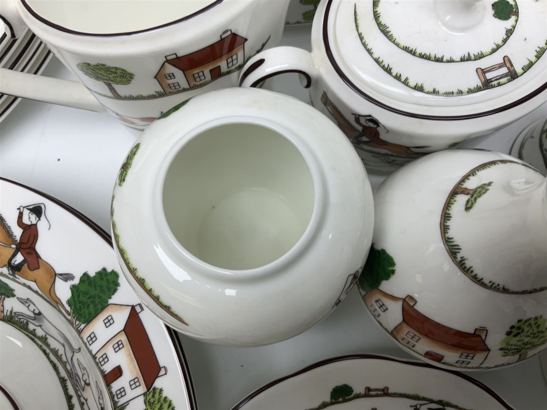 Wedgwood Hunting Scenes dinner and tea service for ten, to include dinner plates, side plates, dessert plates, cups and saucers, mugs, two large teapots, two milk jugs, etc, together with matching items by coalport and Staffordshire (94)