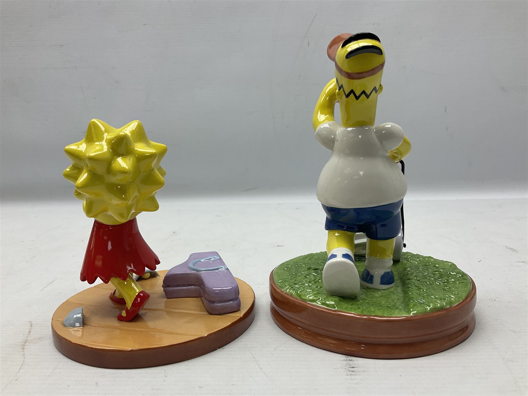 Six Coalport The Simpsons character figures, comprising limited edition 'The Family That Sits Together Fits Together' annual 2005, TS01 Two to Tango, The Gift of Maggie, Will Work For Duff, Yellow Girl Blues and Losing His Marbles, all boxed