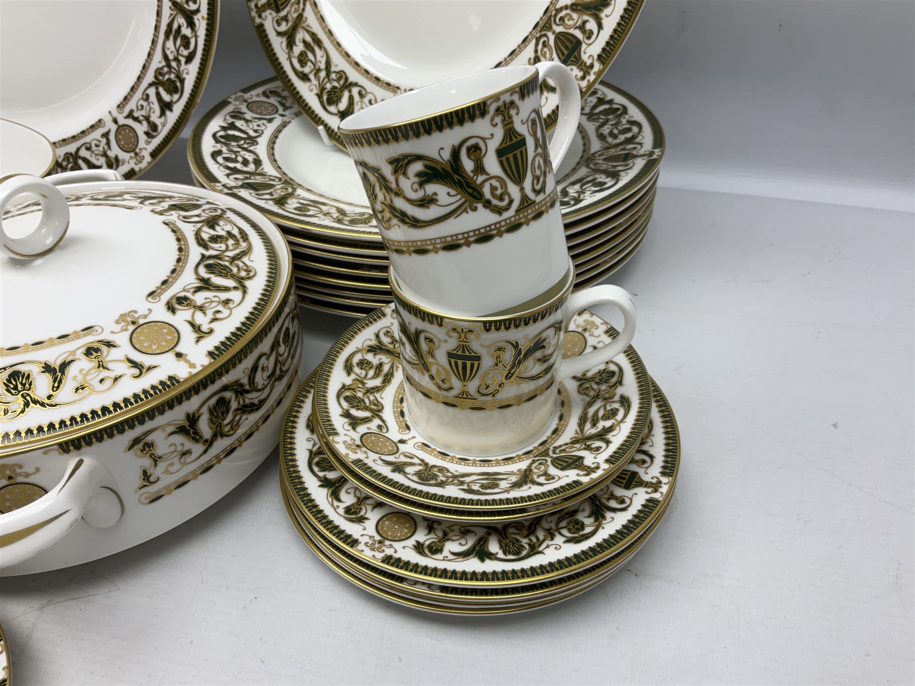 Royal Worcester Windsor pattern part tea and dinner service, comprising nine dinner plates, nine side plates, nine dessert plates, six coffee cans and saucers, sauce boat and plate, two covered tureens, oval dish and serving platter (35)