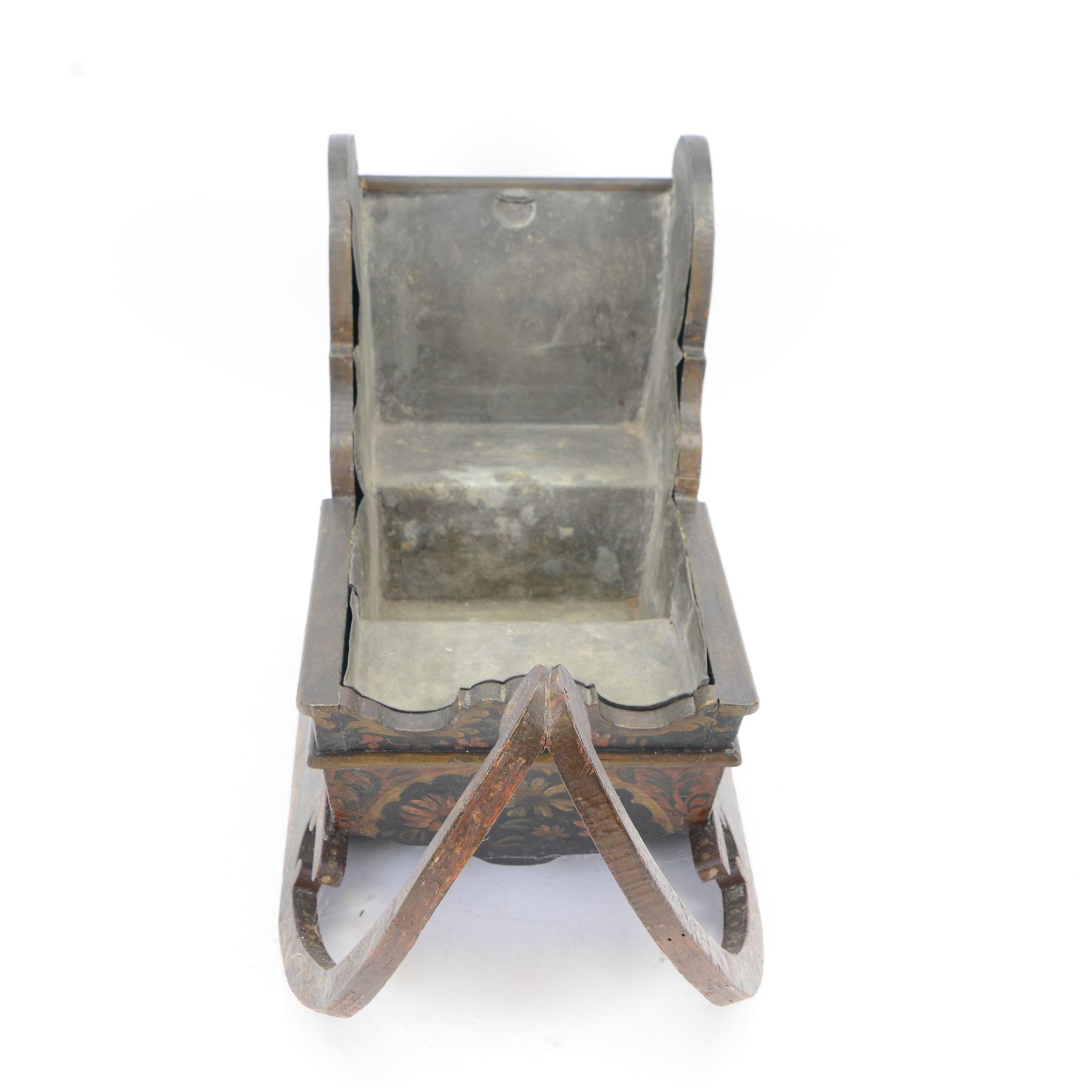 Unusual 18th century small Northern European wooden sled, with curved scroll back, the sides painted with coastal shipping scenes, the interior with removable zinc liner, upon curved irons painted with flower heads, H36cm W56cm D29cm
