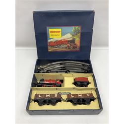 Hornby '0' gauge - 1950s M1 Goods Set box containing clockwork 0-4-0 steam locomotive and matching tender No.3435 with brake, forward and reverse lever and key, together with two 4-wheel LMS open goods wagons and oval of curved and straight tin-plate track and connectors; boxed with illustrated lid