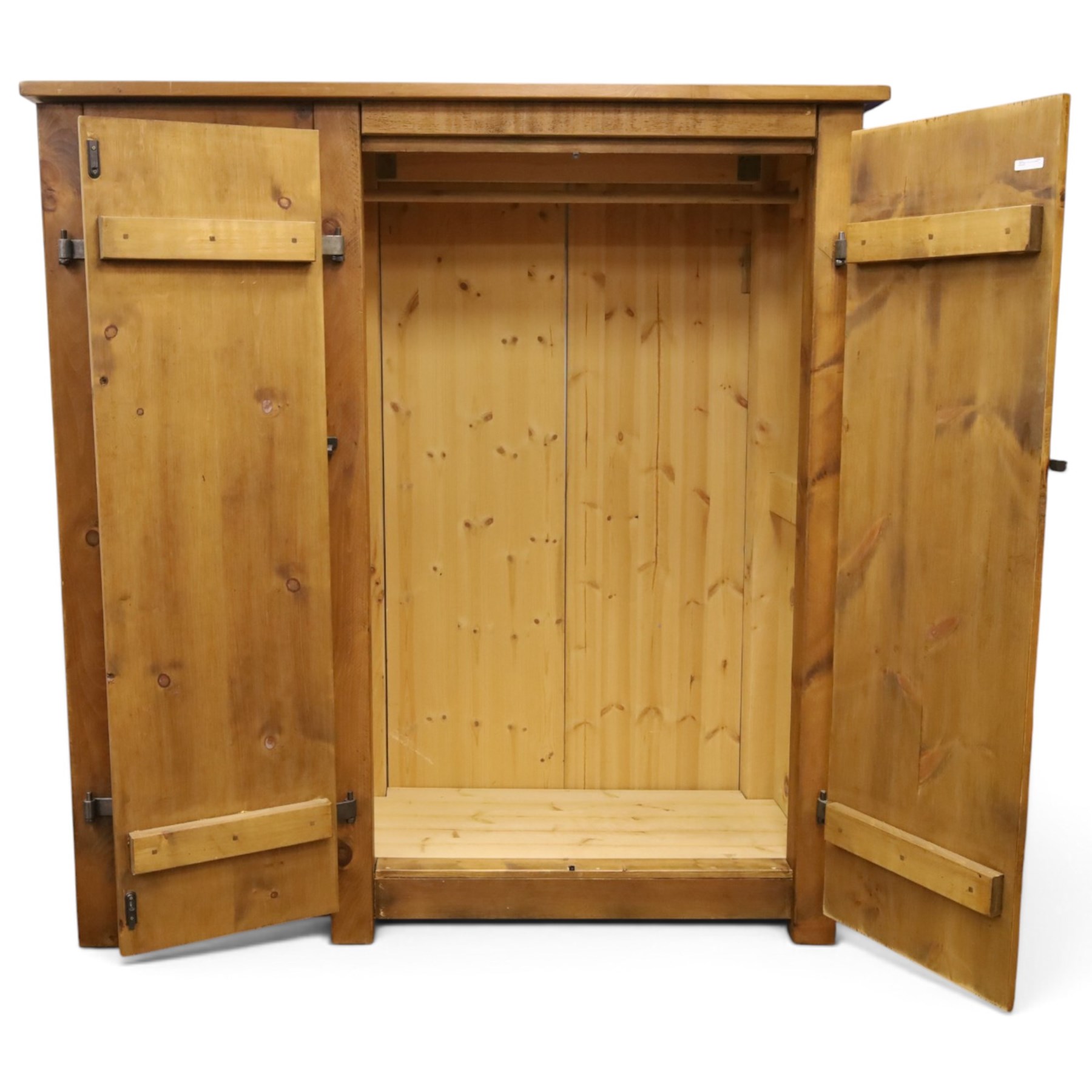 Indigo Furniture - rustic oak triple wardrobe, fitted with three doors with wrought metal fittings and locks, on style supports
