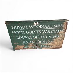 Private woodland walk wooden sign along with large saw and wooden step ladders