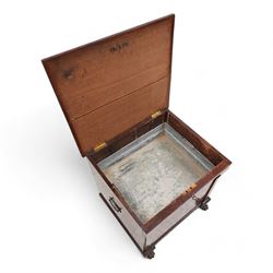William IV mahogany cellarette, the rectangular hinged sarcophagus top enclosing bottle dividers and metal liner, the front applied with flanking flat pilasters, fitted with pressed brass handle plates escutcheon, lower moulded edge over brass hairy paw feet