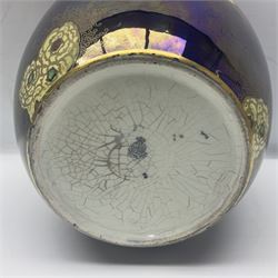 Carlton Ware lustre ginger jar and cover decorated with birds in flight on a blue ground, H32cm