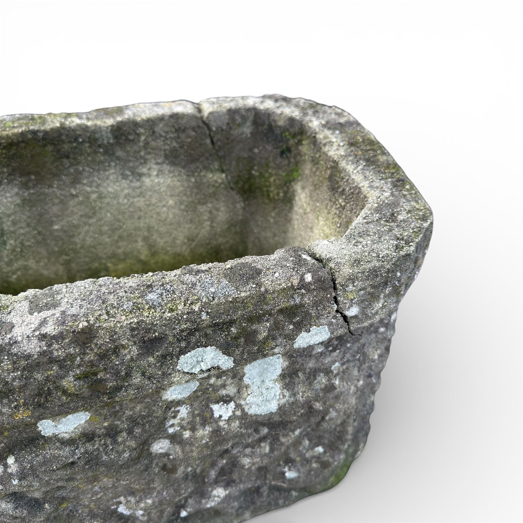 Two cast stone planters / troughs with lion emblems