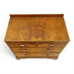 Art Deco figured and burr walnut chest, raised back over rectangular top, fitted with two short over two long drawers with decorative veneer and handles, on shaped bracket feet