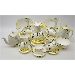  Art Deco Shelley 'Sunlight and Tall Trees' pattern tea and coffee service circa 1935, comprising tea pot & stand, hot water pot, eleven cups, twelve saucers, eleven tea plates, sugar bowl, milk jug, two plates, coffee pot, five cups, six saucers and cream jug (a/f), pattern no. 057 (54)    