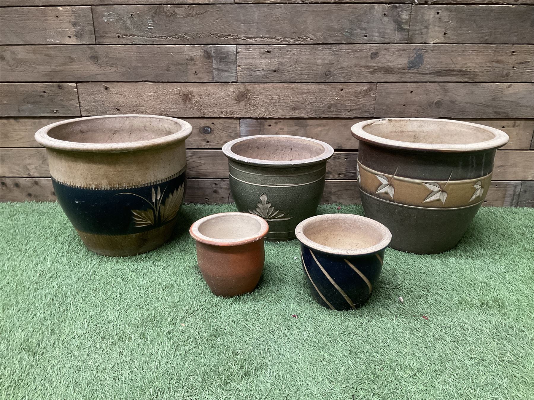 Five terracotta glazed planters 