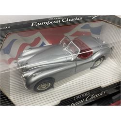 Ertl - three American Muscle 1:18 scale die-cast models comprising 1995 Dodge Ram 2500 SLT; '78 Dodge Lil Red Truck; and 1996 Firebird Trans Am; together with an Ertl European Classics 1:18 scale 1948 Jaguar XK120; all boxed (4)