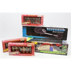 A boxed Terratek metal detector, together with boxed toys, comprising '4 Pack Monster Stunt Trucks', and three 'The Corps 6 Man Operatoion Team'. (5). 