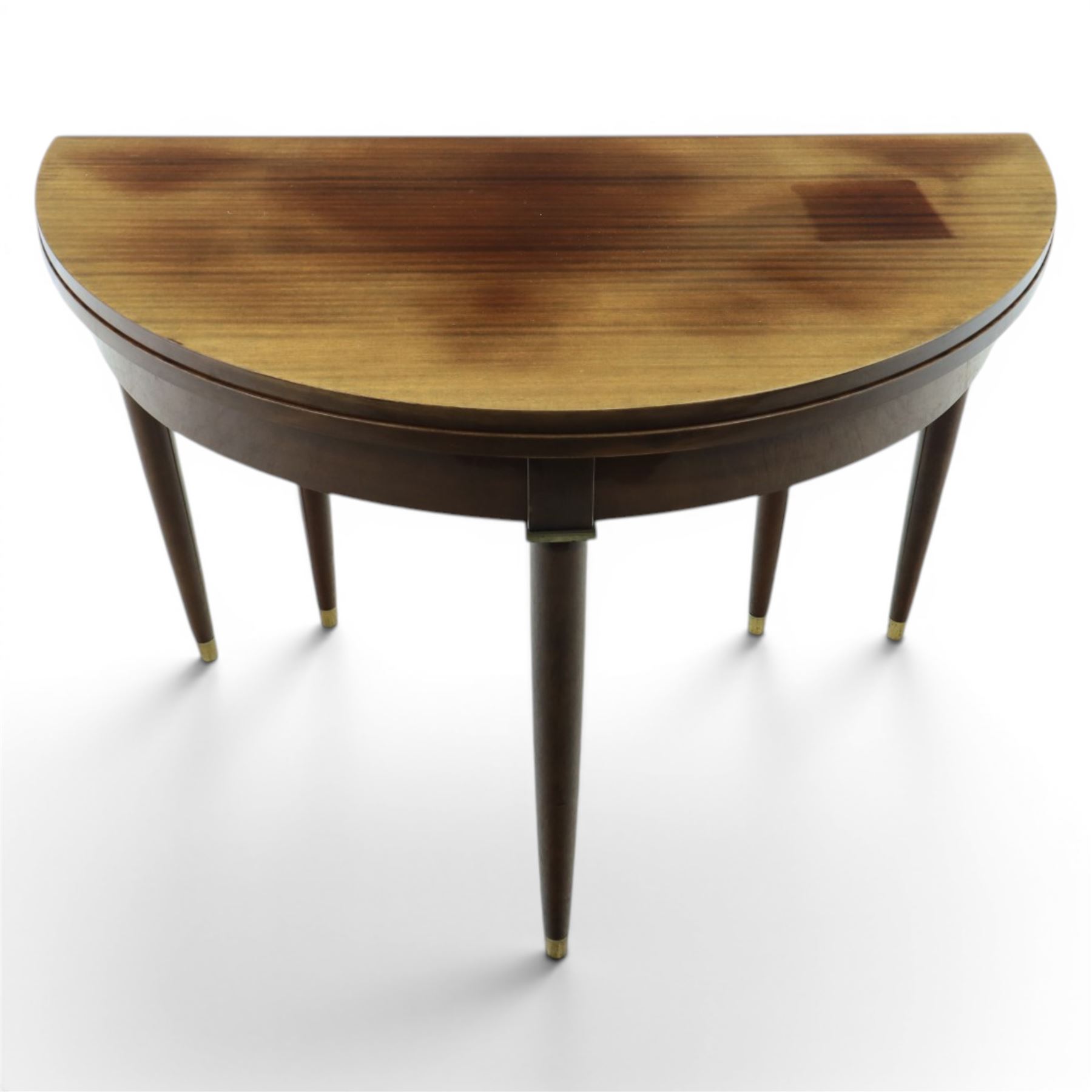 Regency design mahogany demi-lune console dining table, fold-over top extending to circular table, raised on round tapering legs