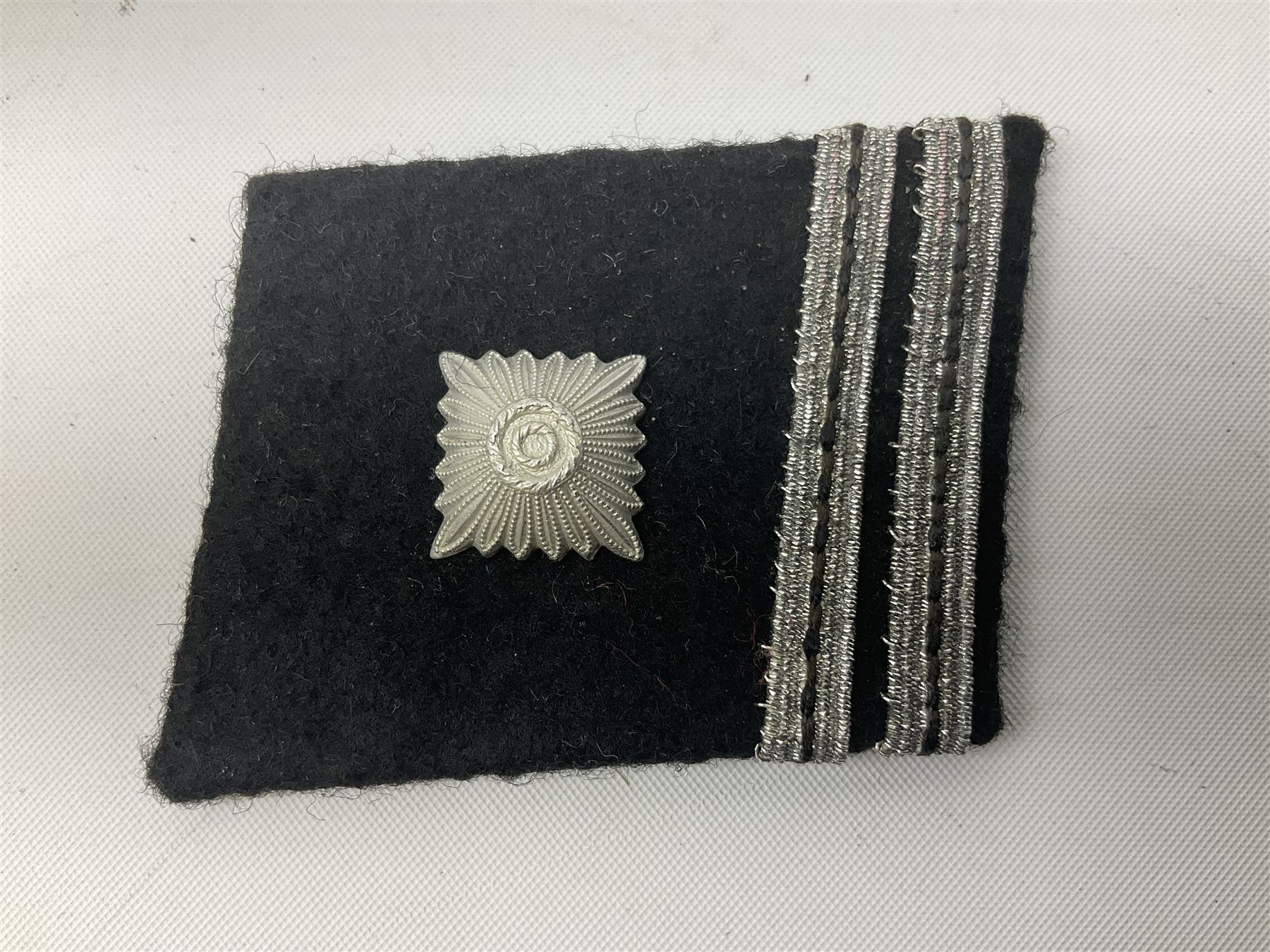 Two WW2 German 'SS' uniform cloth collar patches and sleeve eagle for Schafuhrer rank (3)